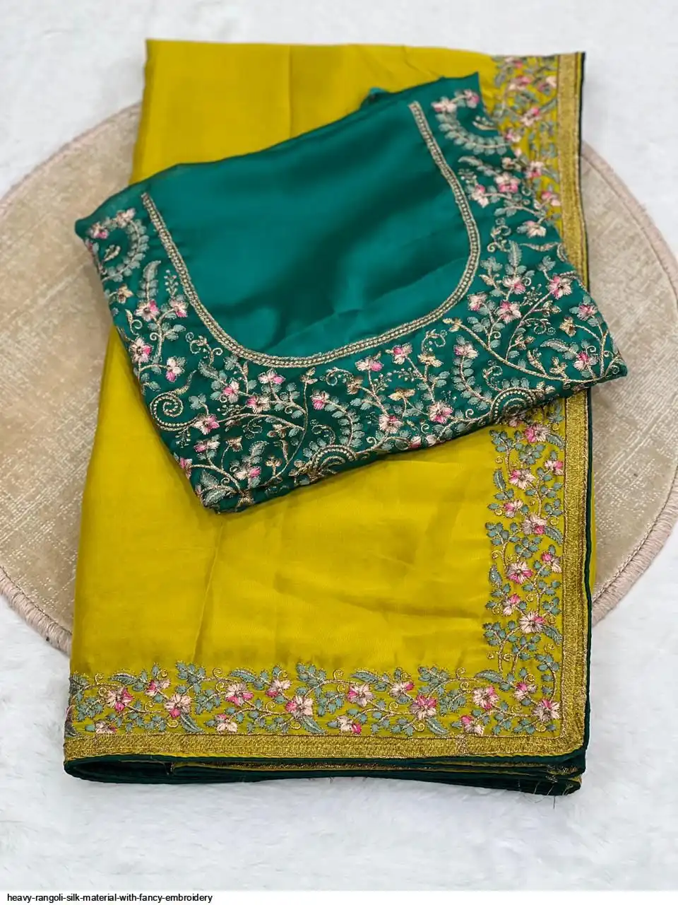 Rangoli Heavy Rangoli silk material with fancy Embroidery Wholesale Catalog