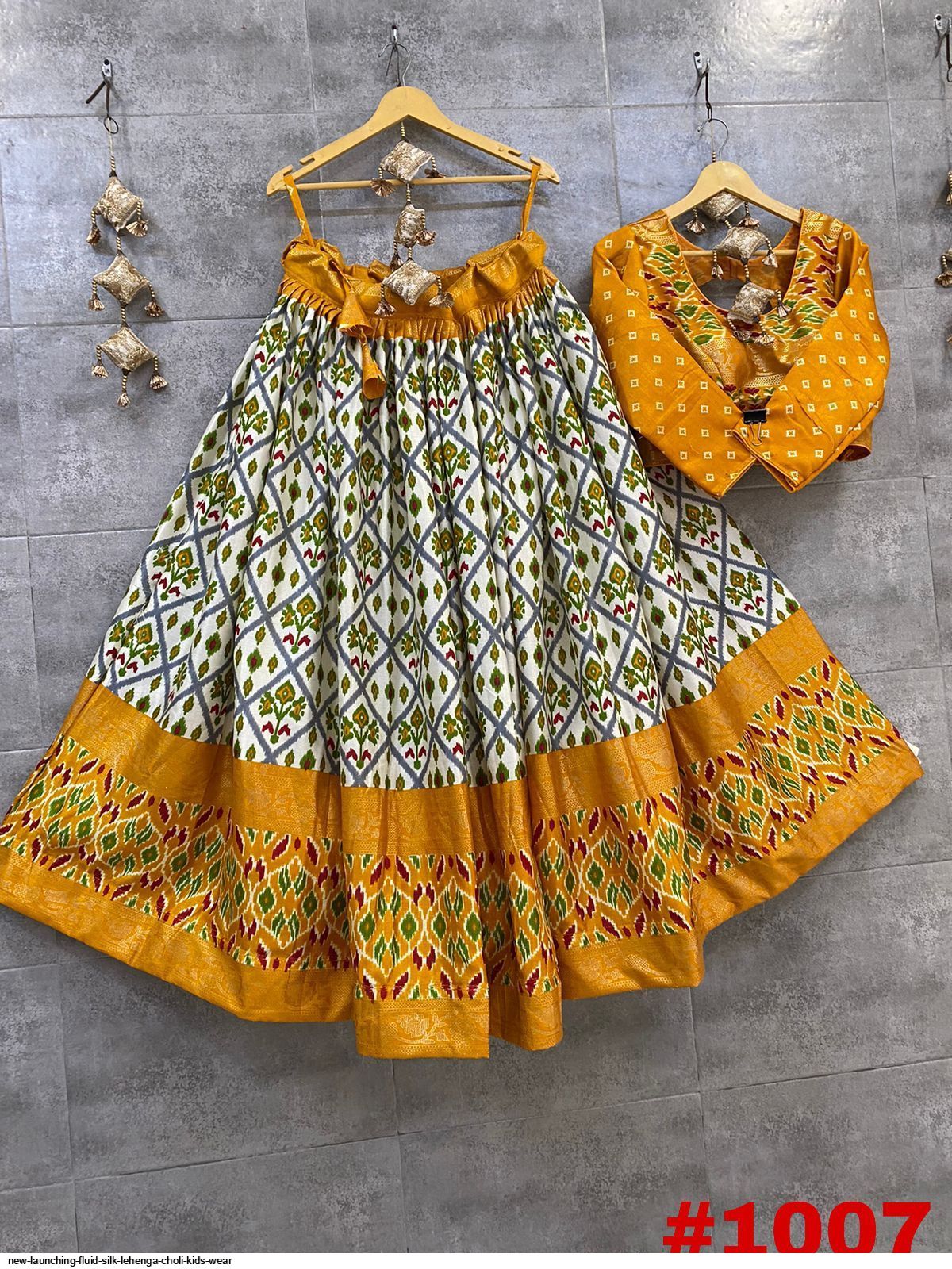NEW LAUNCHING FLUID SILK LEHENGA CHOLI KIDS WEAR 1007