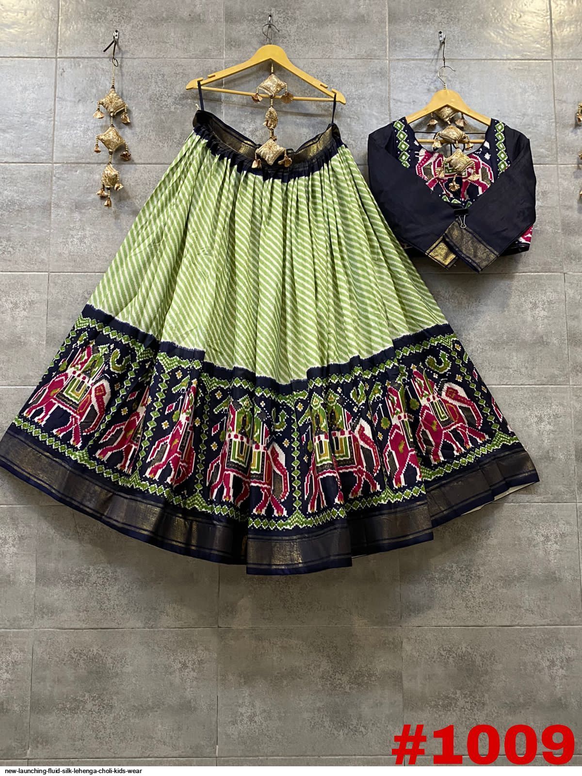 NEW LAUNCHING FLUID SILK LEHENGA CHOLI KIDS WEAR 1009