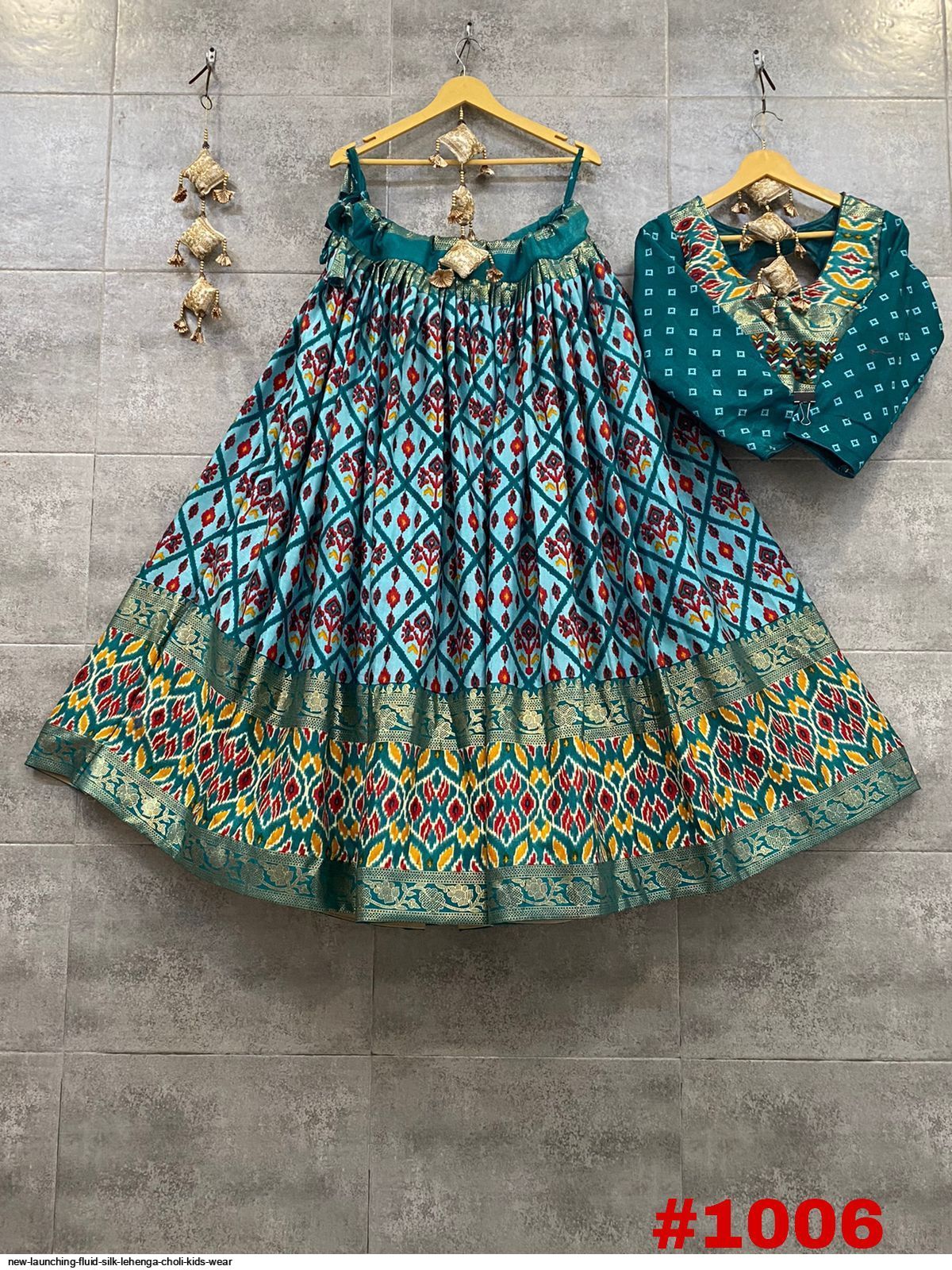 NEW LAUNCHING FLUID SILK LEHENGA CHOLI KIDS WEAR 1006