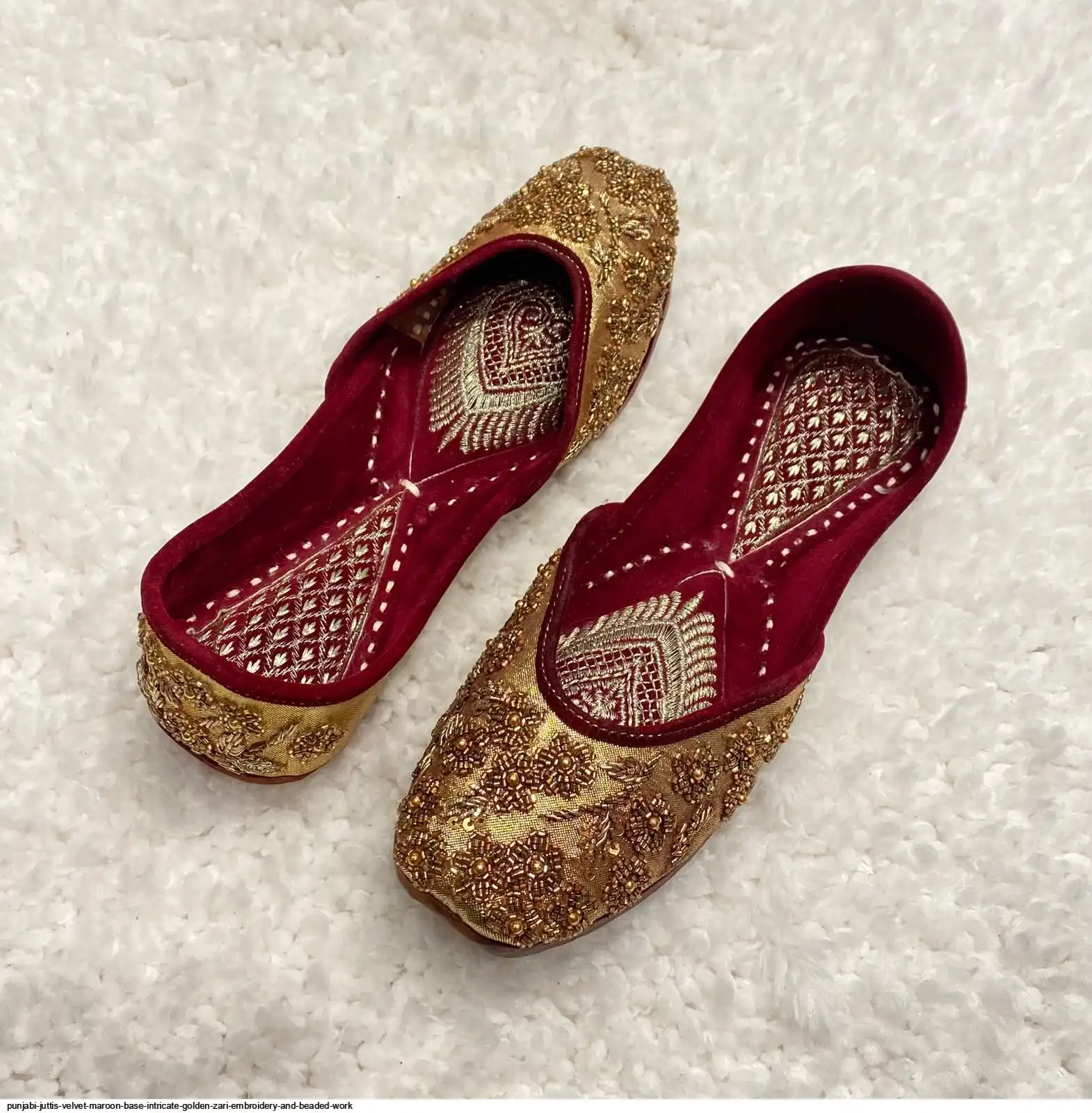 PUNJABI JUTTIS VELVET MAROON BASE INTRICATE GOLDEN ZARI EMBROIDERY AND BEADED WORK A